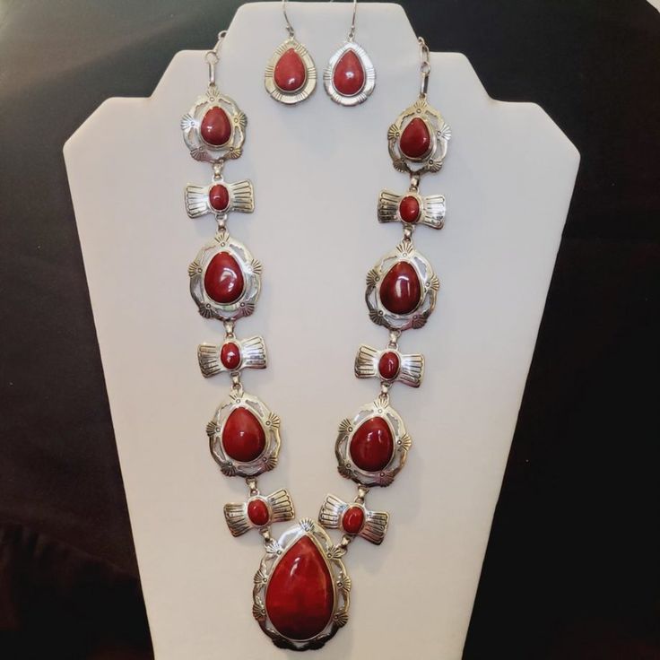 Authentic Red Sponge Coral Necklace & Earrings In Exceptional Decorative 925 Sterling Silver Settings. This Is An Elegant One-Of-A-Kind Necklace & Earrings!! The Stones Are An Exceptional Vibrant Dark Red Color With No Inclusions Or Impurities, W/Smooth Surfaces, Best Clarity, & Of The Highest Quality While Offering Most Reasonable Prices. This Is An Absolutely Stunning Necklace!! Necklace: Hook Style Clasp. Large Tear Drop Stone: 1-1/2" X 2-1/4". Earrings: Oval Stones Are 7/8" X 1-1/8". Red Teardrop Jewelry With Matching Earrings, Red Dangle Jewelry For Formal Occasions, Elegant Red Dangle Jewelry, Elegant Red Sterling Silver Jewelry, Red Dangle Costume Jewelry, Red Sterling Silver Necklace With Matching Earrings, Handmade Red Sterling Silver Jewelry, Formal Red Jewelry With Matching Earrings, Elegant Handmade Red Jewelry