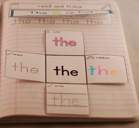 an open notebook with cut out words on the pages that spell out the word's