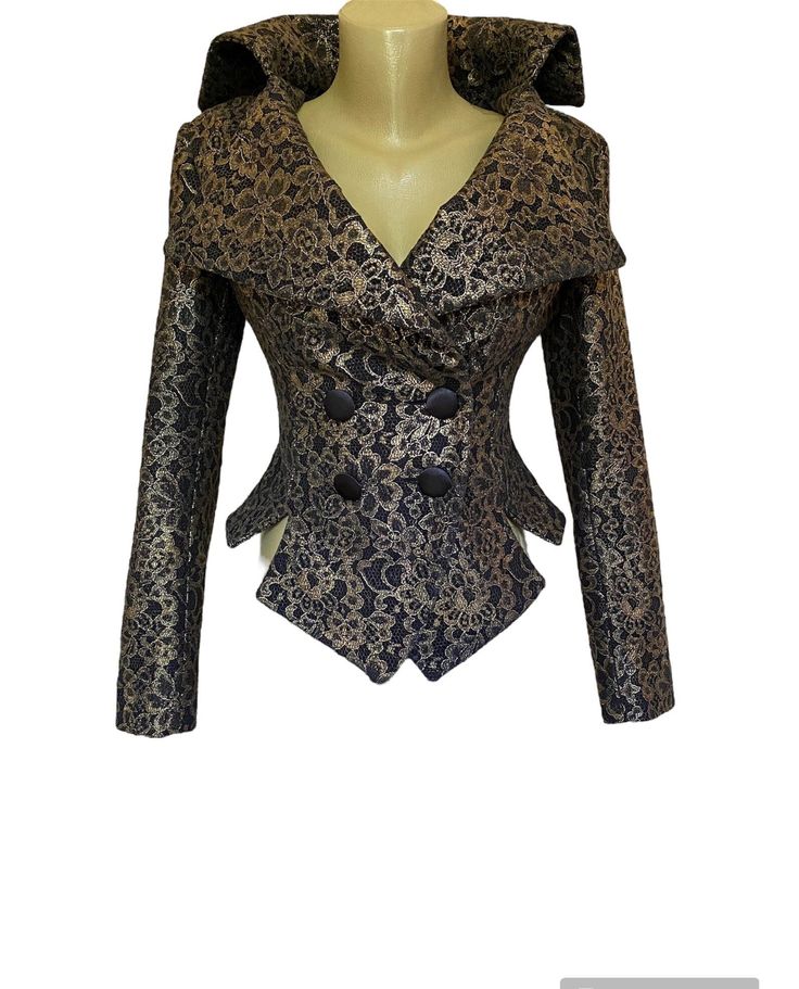 "Formal bronze lace jacket This elegant fitted wedding or formal jacket is made of fine black fabric fully covered with antique gold lace. Double breasted with black satin covered buttons. Suitable for formal day and evening occasions. SIZE CHART SIZE S - US 6, UK 8, EU 36 bust: bust around 34.5\"/90cm Waist: waist around 27.5\"/70cm Hips: hips around 34.5\"/90cm SIZE M - US 8, UK 10, EU 38 bust: bust around 37.5\"/95cm Waist: waist around 29.5\"/75cm Hips: hips around 37.5\"/95cm SIZE L - US 10 Luxury Evening Blazer With Gold Buttons, Luxury Gold Evening Blazer, Fitted Outerwear With Historical Design For Formal Occasions, Elegant Fitted Blazer With Gold Buttons, Formal Fitted Lace Blazer, Elegant Formal Outerwear With Gold Buttons, Gold Fitted Blazer For Party, Fitted Gold Blazer For Party, Gold Fitted Luxury Blazer