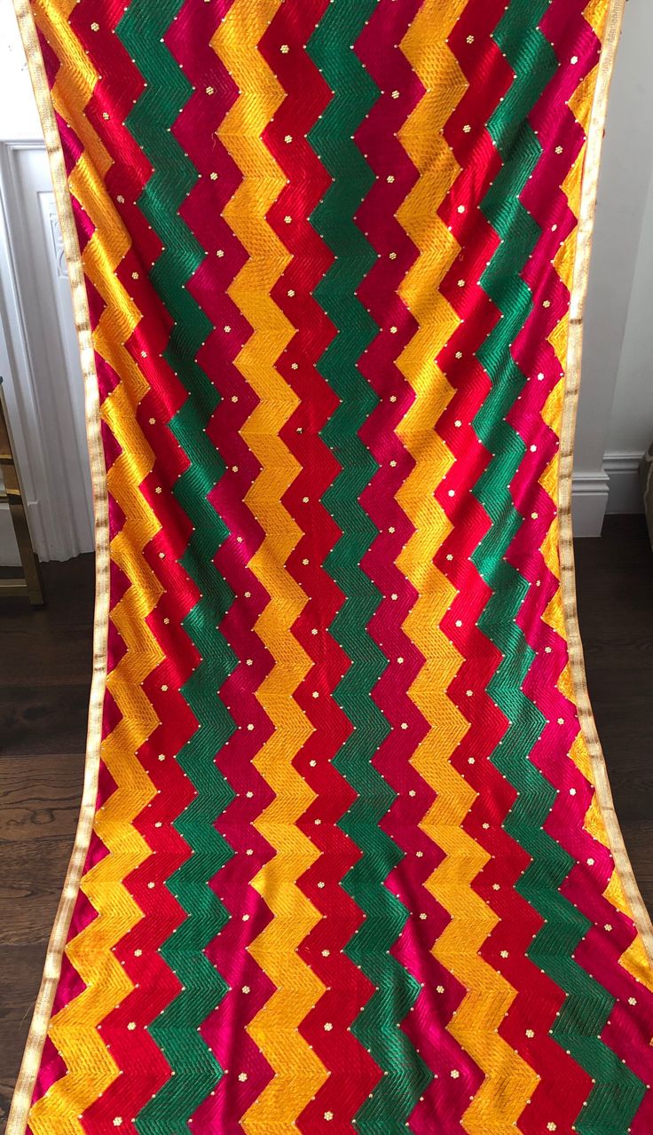 Phulkari Bagh Dupatta Fulkari Duppatta Punjabi Weddings Shawl Multicoloured Goes with any colour outfit. Multicoloured / Black and Beige Chinon fabric base Geometric Pattern  With or Without Embellishments  Machine Embroidered  Resham Thread Embroidery Full Size 2.25 meter Duppatta. 36x89 inches (all measurements approx) Shipping within UK is via Royal Mail/ Hermes. International shipping can take from 10-15 working days, Carrier Royal Mail/ FedEx/UPS. Expedited delivery available please get in touch. Any questions you have please do not hesitate to get in touch. Thanks for looking🙏 Multicolor Anarkali Set For Traditional Ceremonies During Eid, Embroidered Dupatta For Festivals And Celebrations, Festive Embroidered Fabric With Dori Work For Celebration, Multicolor Choli With Gota Work For Celebration, Multicolor Choli For Navratri Celebration, Traditional Multicolor Choli With Zari Work, Chinon Embroidered Fabric For Navratri Celebration, Festivals Multicolor Choli With Resham Embroidery, Embroidered Multicolor Saree For Diwali