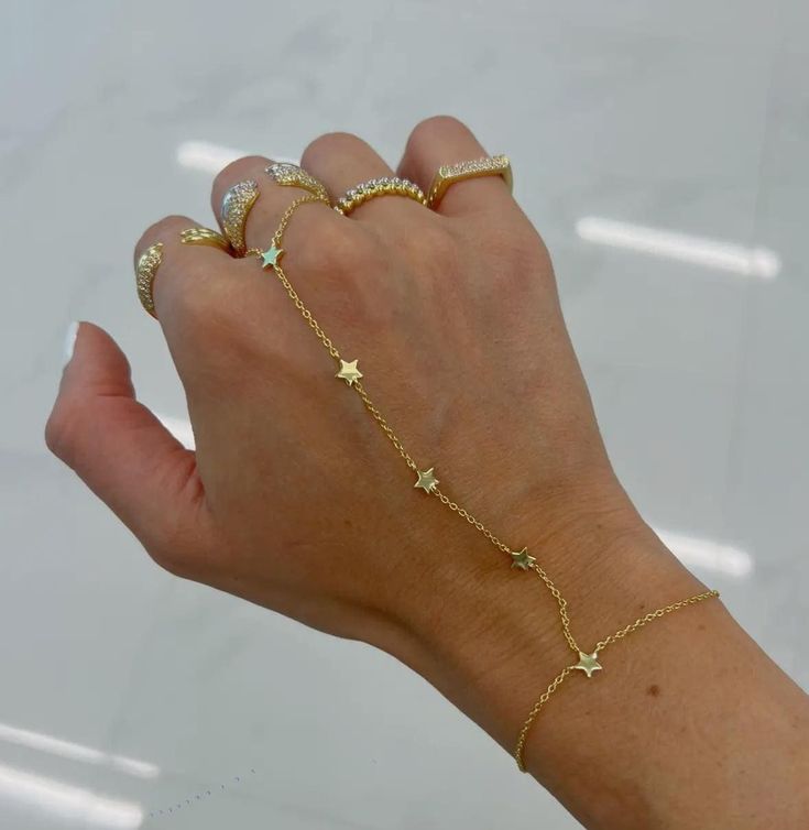 18k gold over brass Stars: 5mm  Bracelet: 6 inches Gold Hand Chain, Hand Chain Bracelet, Crystal Beads Bracelet, Gold Hand, List Ideas, Hand Chain, Fancy Jewelry, Gold Hands, Jewelry Inspo