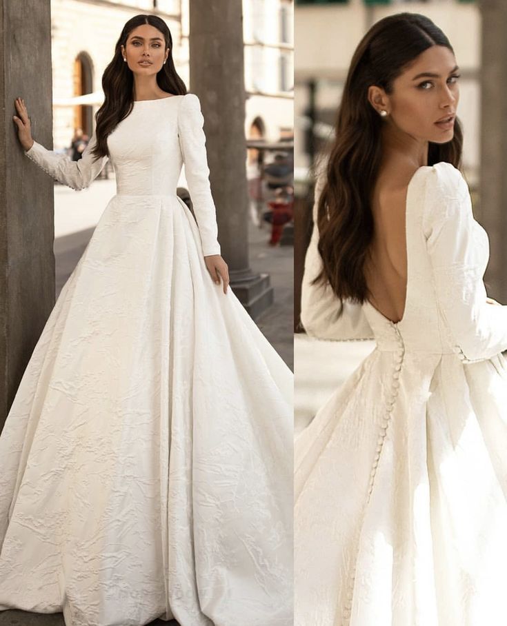 a woman in a white wedding dress standing next to another woman wearing a long sleeved gown