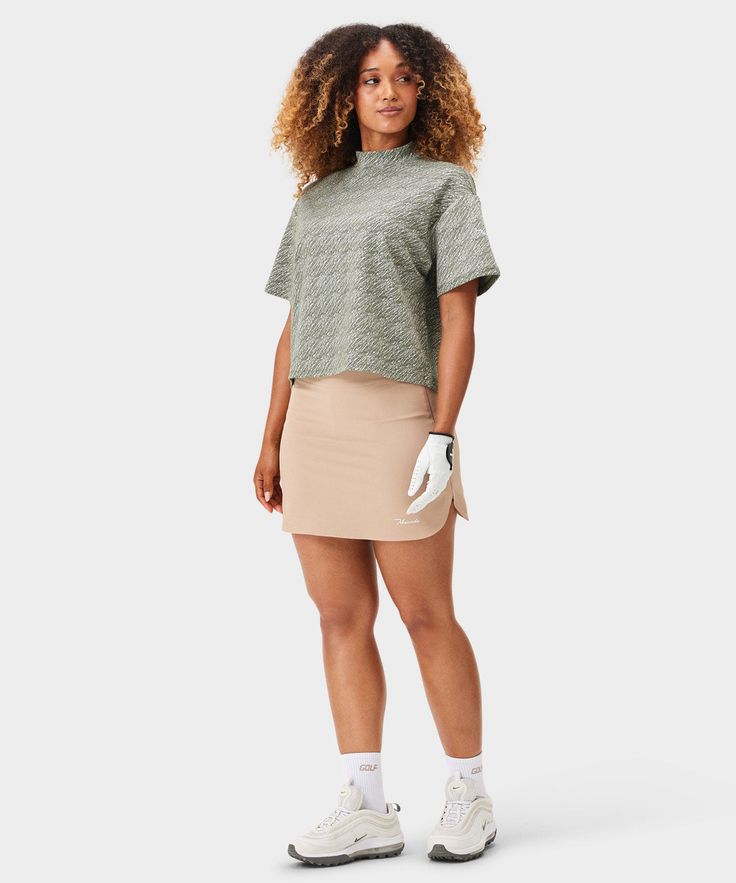 An effortless look for a hard-working golfer. The Madison Crop Tee is designed for social golfers and tour professionals alike. The piece features dropped shoulders and a wide silhouette for an overall relaxed feel. Wear it on the range, on the course, and when hoisting up the well-earned trophy. Casual Crew Neck Top For Golf, Functional Short Sleeve Golf Tops, Cotton Golf Tops, Functional Cotton Tops For Golf, Functional 4-way Stretch Golf Tops, Instagram Men, Layered Shirts, The Madison, Hard Working