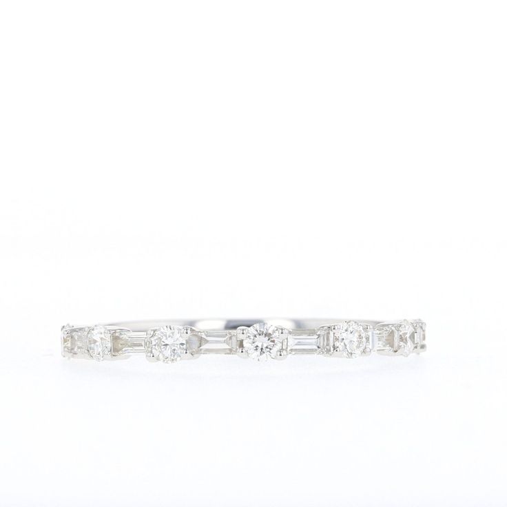 Diamond Baguette and Round Band Metal: 14K White GoldDiamonds: Six 3x1.25mm SI2-SI3, GHI Step Baguette Genuine Diamonds, Seven 2.2mm SI2-SI3, G-H Round Full Cut Genuine Diamonds White Gold Eternity Band With Baguette Diamonds, Diamond White Eternity Band With Baguette Diamonds, Elegant Eternity Band With Baguette Diamonds In Cubic Zirconia, Elegant Cubic Zirconia Eternity Band With Baguette Diamonds, Cubic Zirconia Eternity Band With Baguette Diamonds, Elegant Baguette Cut Channel Set Eternity Band, Elegant Baguette Cut Eternity Band, Round Eternity Band With Baguette Diamonds, Timeless Eternity Band With Baguette Cut Diamonds