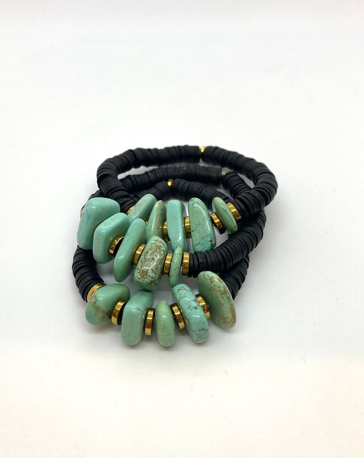 "This listing is for 1 bracelet made with Black African clay discs and turquoise chip beads. My hand-beaded bracelets are made with stretch elastic which makes it comfortable and easy to wear.  My bracelets are made to fit an average wrist size of 6.5\"-7\". Take a look around my shop for additional colors to add to your stack! The more the better!" Chip Bracelet, Bracelet Quotes, Chip Beads, Bracelet Black, Heishi Beads, Name Bracelet, Photo Bracelet, Grey And Gold, Hand Beading