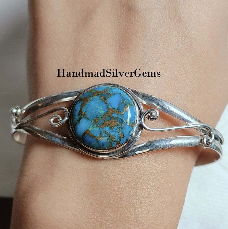 Blue Copper Turquoise Bangle, 925 Sterling Silver, Handmade Bangle, Designer Bangle, Gemstone Bangle, Silver Bangle, Women Bangle Gifts -------------------------------------------------------------------- Benefits of Turquoise Stone Copper Turquoise soothes and clears sore throats, purifies lungs, and heals the eyes, as well as cataracts. Copper Turquoise dispels negative energy and is said to be a purification stone. It instils inner calm and by balancing all the chakras it stabilises the mood swings (the frame of mind). Product Detail: Metal : 925 Sterling Silver Gemstone : turquoise Stone Color : Blue 925 Stamp. The perfect gift for a Special occasion. Wholesale Orders Accept on Wholesale Price. Fast shipping after Payment Received Perfect For: ---------------- ♥ Birthday Gift ♥ ♥ Holid Handmade Round Turquoise Bracelets, Nickel-free Round Turquoise Bracelets, Handmade Turquoise Sterling Silver Bracelets, Elegant Round Turquoise Bracelet, Elegant Turquoise Round Bracelet, Southwestern Silver Bracelets With Natural Stones, Adjustable Blue Oyster Bracelet Jewelry, Adjustable Gemstone Bangle, Adjustable Round Bangle With Gemstone