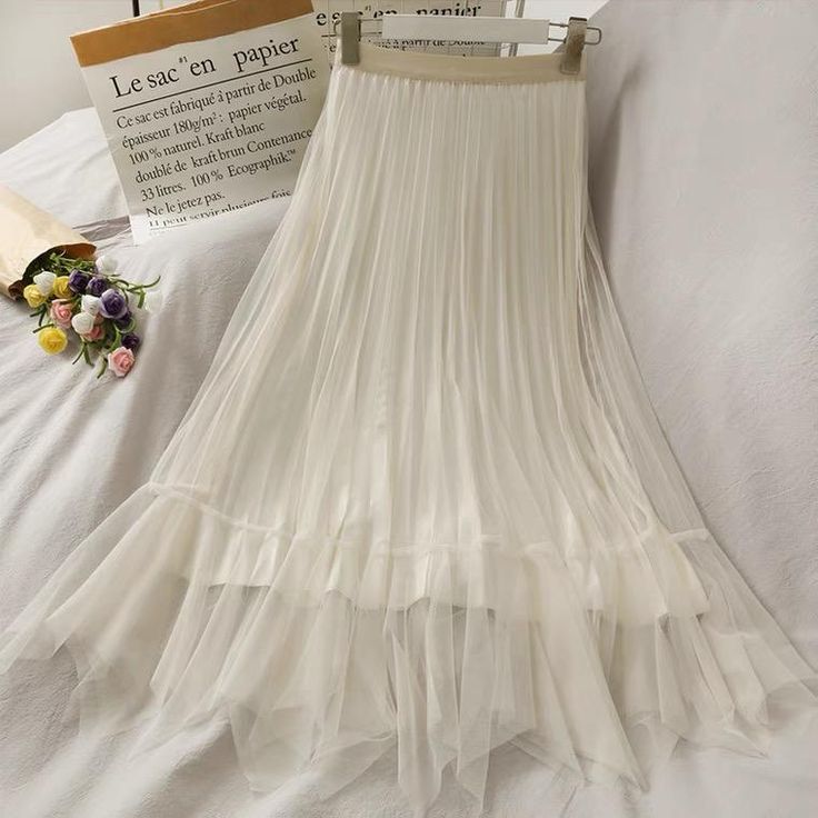 Material:tulle Features:glossy Color:black,blue,apricot.brown Size(cm):Free Length: 85CM,Waist : 62-76CM Note:Due to different measurement methods,there will be 1-3 error(unite:cm), please understand. Spring Tulle Skirt With Stretch, Spring Stretch Tulle Skirt, Elegant Non-stretch Pleated Flared Skirt, Elegant Non-stretch Flared Pleated Skirt, Elegant Non-stretch Pleated Skirt, Chic Non-stretch Tulle Skirt, Chic Tulle Flared Skirt, Elegant Non-stretch Tiered Skirt, Non-stretch Elegant Flared Skirt