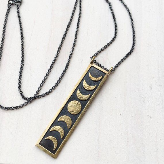 Brass Moon Phase Pendant. Moon Phase Jewelry. Lunar Inspired Necklace. Moon Phase Necklace. Occult J Crescent Moon Phase Brass Jewelry, Celestial Brass Moon Phase Necklaces, Celestial Moon Phase Brass Necklace, Celestial Brass Moon Phase Necklace, Celestial Moon-shaped Hand Forged Jewelry, Celestial Brass Necklace With Moon Phase, Celestial Brass Necklace With Moon Phase Detail, Celestial Moon-shaped Brass Jewelry, Spiritual Moon Phase Jewelry