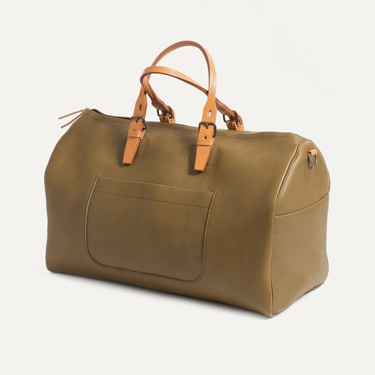 Leather travel bag for Men - Made in france | Bleu de chauffe Khaki Tote Bag For On-the-go, Classic Duffle Bag With Large Capacity For On-the-go, Rectangular Satchel With Luggage Sleeve For On-the-go, Modern Tan Bag With Top Carry Handle, Classic Box Bag With Leather Handles For Errands, Green Double Handle Travel Bag For On-the-go, Tan Rectangular Bag, Classic Rectangular Box Bag For Errands, Green Tote Weekender Bag For On-the-go