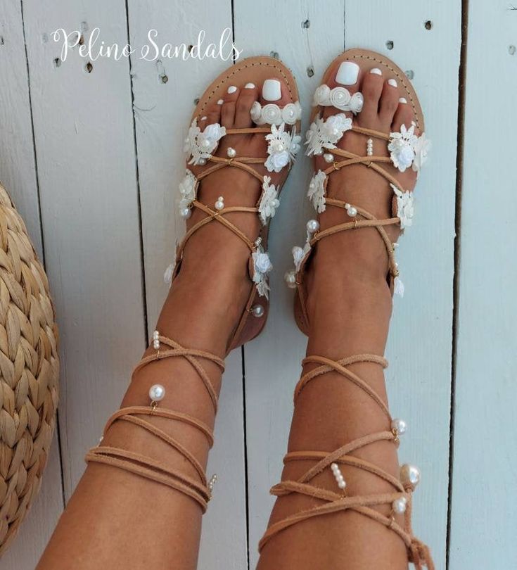 Gladiator wedding Sandals with studded center strap. Full sizes only ** If you have half the size, go UP to the nearest full size. ** If you are unsure of your size, please contact me so I can assist you. Check out our other wedding sandals here: MORE WEDDING SANDALS: https://www.etsy.com/listing/932339383/wedding-sandals-lace-wedding-shoes-beach?ref=shop_home_feat_4&pro=1&frs=1 https://www.etsy.com/listing/753113455/wedding-sandals-bridal-sandals-beach?ref=shop_home_active_28&pro=1& Round Toe Sandals For Spring Wedding, Spring Wedding Sandals With Flat Heel, Spring Wedding Sandals With Round Toe, Spring Wedding Flat Heel Sandals, Summer Party Barefoot Sandals With Single Toe Strap, Spring Wedding Lace-up Ankle Strap Sandals, Summer Wedding Shoes With Heel Strap And Closed Toe, Flat Heel Summer Wedding Shoes, Summer Wedding Shoes With Flat Heel