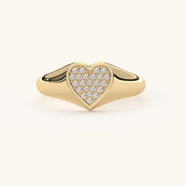 FEATURES Made with premium 14k solid gold, this ring ensures outstanding durability and lasting beauty. Its polished finish delivers a sleek and comfortable fit for everyday wear.* Handmade / Handcrafted Gold Ring* Gold KT Options: 14K Gold* Color Options: Yellow Gold, Rose Gold, White Gold* Width: 9.04 mm top 1.81 mm bottom* Thickness: 1.28 mm * Gemstone: Cubic Zirconia (Available with Real Diamond, Lab Created Diamond, Moissanite or other Natural Stones upon request)* Stone Shape: Round * Stone Sizes: 14 pcs 1.3 x 1.3 mm 8 pcs 1.2 x 1.2 mm 1 pcs 1.1 x 1.1 mm * Quantity of Stone: 23 * Quality: AAA Signet Ring With Diamond, Pinky Ring For Women, Pinky Rings For Women, Meaningful Gifts For Her, Gold Pinky Ring, Stackable Rings Wedding, Diamond Signet Ring, Heart Band, Diamond Heart Ring