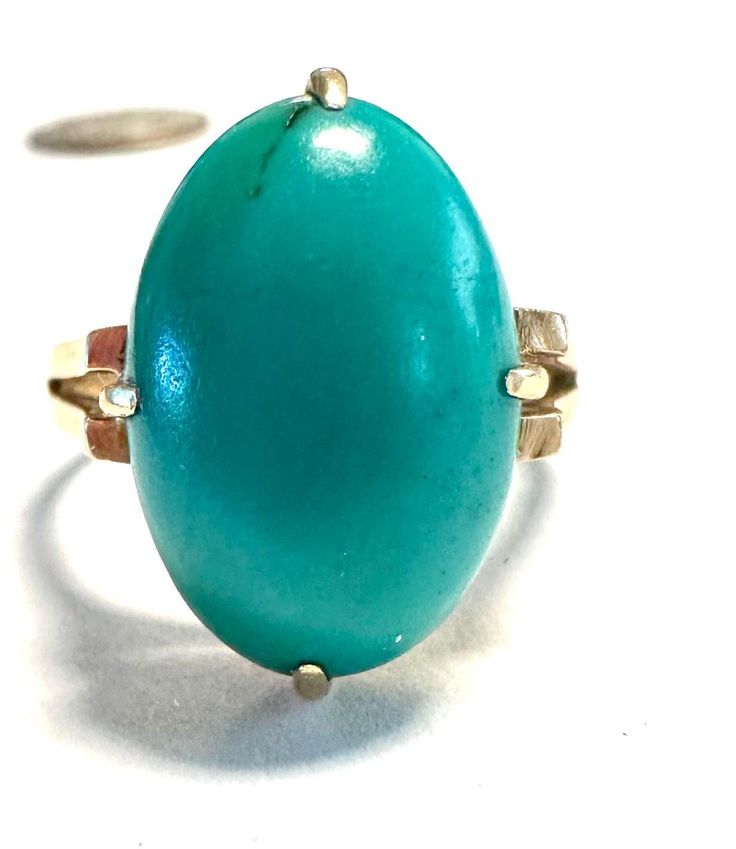 14k ring Gorgeous Turquoise Cabochon in a clean classic Victorian design.  Condition is very good for its age, pictures show the details.  Size 6 3/4, 2/3" north to south on finger, wt.- 5 grams.  Well designed, prong set Turquoise. Classic Turquoise Ring For Formal Occasions, Classic Formal Turquoise Ring, Vintage Yellow Gold Oval Turquoise Ring, Vintage Yellow Gold Turquoise Oval Ring, Formal Oval Cabochon Turquoise Ring, Antique Oval Turquoise Ring Hallmarked, Classic Yellow Gold Turquoise Gemstone Ring, Antique Oval Turquoise Ring, Elegant Yellow Gold Turquoise Cabochon Ring