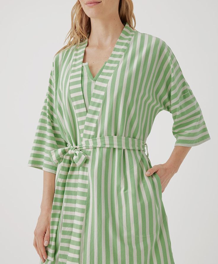 The Staycation Short Robe is our cozy solution to looking cute even before the coffee is poured. Pair this floral number with our Matching Sleep Pants and let &apos;em know you woke up like this Super soft, premium jersey knit Dropped shoulders, loose sleeves Removable belt with waist loops Relaxed Fit Green Sleepwear For Spring, Green Relaxed Fit Sleepwear For Spring, Green Cotton Sleepwear For Spring, Green Cotton Spring Sleepwear, Comfortable Green Sleepwear For Spring, Comfortable Spring Beach Sleepwear, Comfortable Beach Sleepwear For Spring, Striped Sleepwear For Vacation, Spring Striped Sleepwear For Loungewear