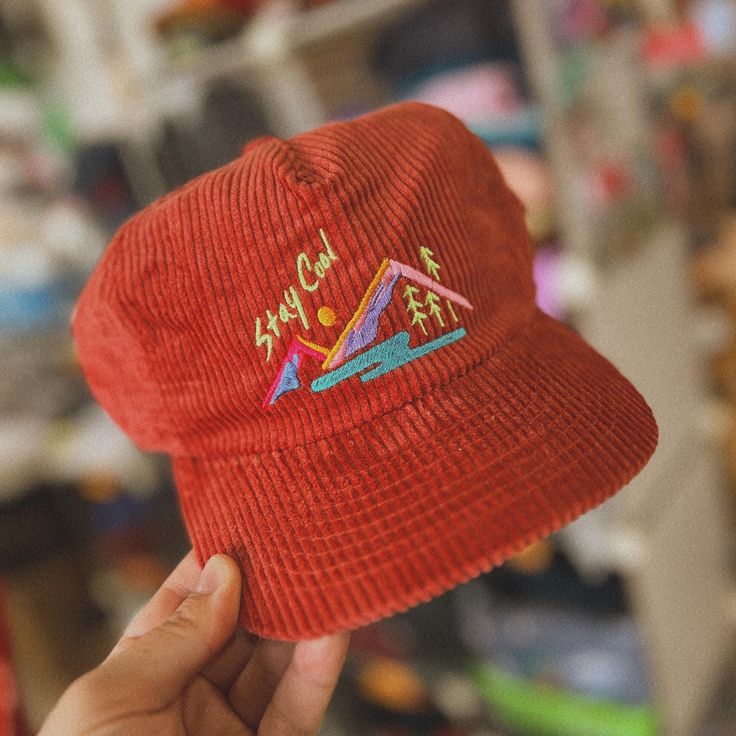 As child of the early 90s, I felt like it was high time I came up with a design that felt 90s, on an equally retro hat. This hat is all about adventure and chill vibes. Stay cool! Embroidered directly onto a super soft corduroy hat, that's sure to become your new favorite.  Please note: these hats are somewhere in between a flat bill and a curved bill. The brim can bend quite a bit to suite your preference.  Hat specs:  5 panel unstructured crown.  Corduroy Fabric Fabric Strap with Brass Metal C Fun Hats With Curved Brim For Outdoor Activities, Fun Curved Brim Hats For Outdoor Activities, Playful Cap For Outdoor Activities, Playful Outdoor Activities Cap, Casual 5-panel Winter Hat, Casual 5-panel Snapback Hat For Winter, Casual Winter 5-panel Snapback Hat, Playful Snapback Hat For Outdoors, Playful Snapback Hat For Outdoor