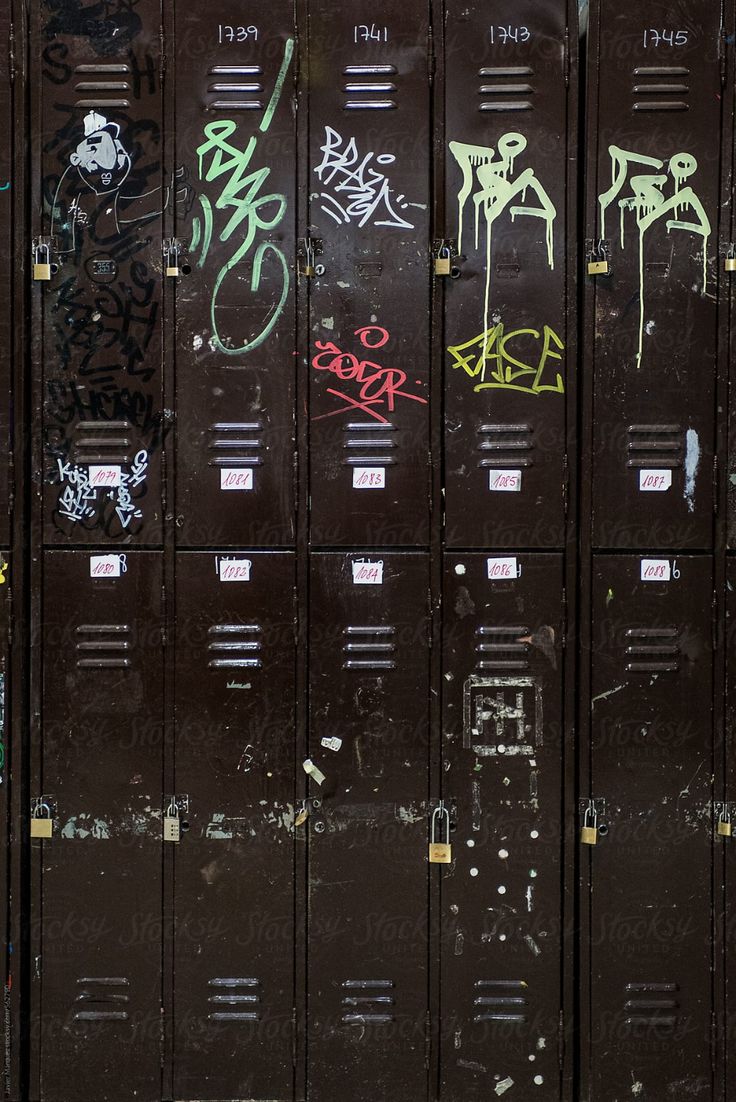 several lockers with graffiti all over them