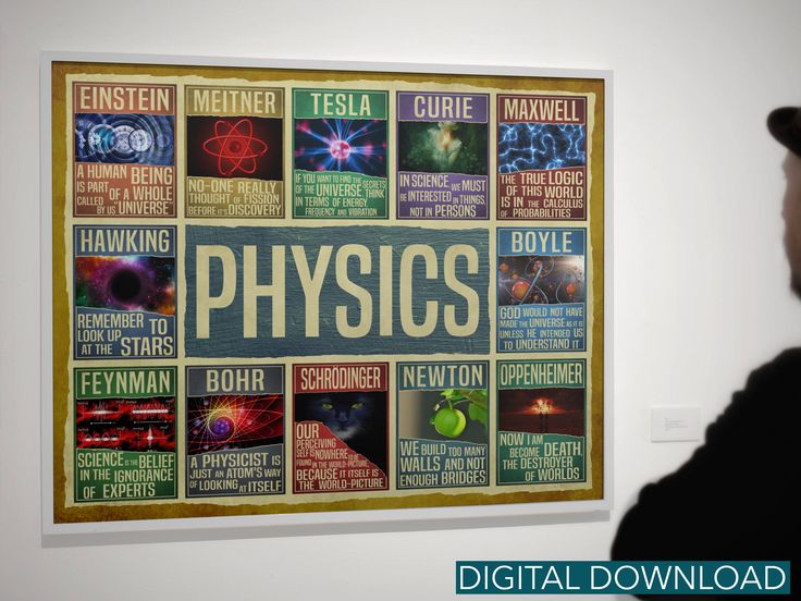 a man standing in front of a poster with words on it that say, physics