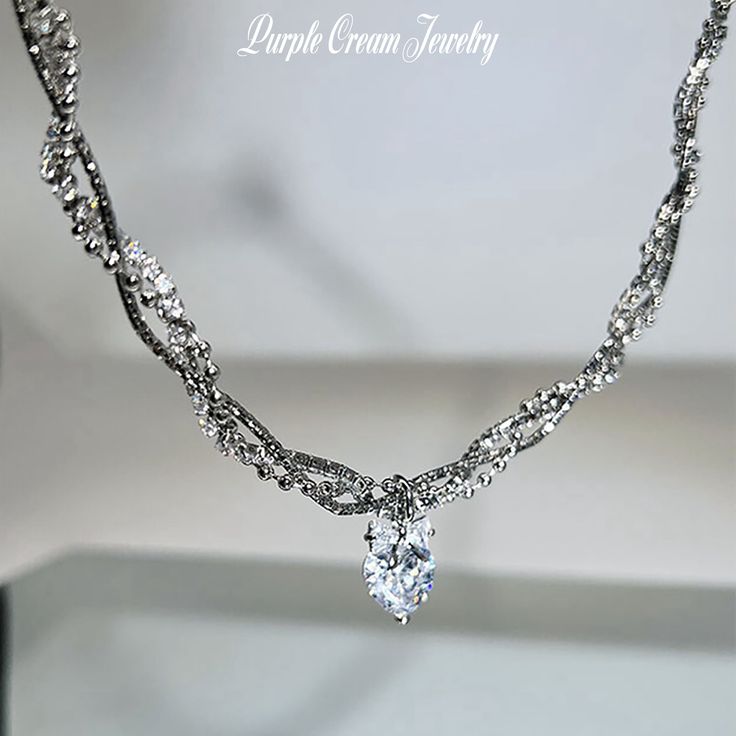 A necklace with a ribbon and heart motif zirconia pendant top♡

 This is a unique chain that consists of three types of chain: snake, ball, and rhinestone.

 Comes with a long adjuster so you can adjust the length.



 Color: Silver

 Chain length: approx. 40cm (+ 5cm adjuster)

 Pendant size: approx. 1.5cm x 1.1cm

 Material: Zinc alloy



 As this is an imported product, please refrain from purchasing if you are sensitive or looking for perfection. Elegant Crystal Heart Pendant Rhinestone Necklace, Elegant Crystal Rhinestone Heart Pendant Necklace, Elegant Rhinestone Crystal Necklace With Heart Pendant, Elegant Cubic Zirconia Rhinestone Necklace For Valentine's Day, Elegant Crystal Rhinestone Necklace For Valentine's Day, Elegant Crystal Rhinestone Heart Necklace, Elegant Heart-shaped Cubic Zirconia Rhinestone Necklace, Elegant Rhinestone Necklace For Valentine's Day Anniversary, Elegant Heart-shaped Rhinestone Necklace For Parties