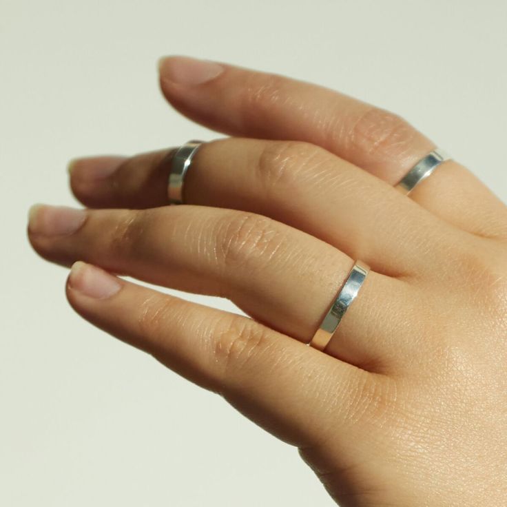 Our chunkiest stacking ring takes dainty and gives it a gentle punch in the face. (Gently!) Easy to wear and looks great on everyone! Also available in solid 14k yellow or rose gold, and in first knuckle (aka midi ring) sizes. Engraving available! All numbers, capital letters as well an ampersand (&) available, no other characters or punctuation. Engraving only available on outside of band. We are not able to offer custom fonts or characters. Tomboy Rings, Tomboy Jewelry, Knuckle Rings Silver, Catbird Jewelry, Punch In The Face, Sterling Silver Stacking Rings, Knuckle Ring, Midi Ring, Teenage Fashion