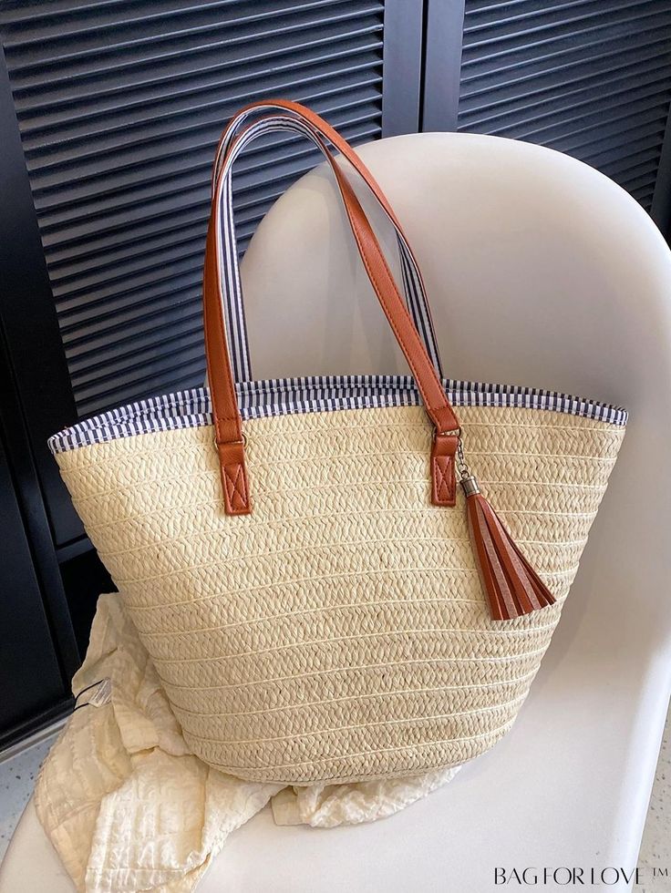 BagForLove - Oversized Minimalist Straw Bag with Tassel Decor - Perfect for Vacation Product Description Color Beige Strap Type Double Handle Pattern Type Striped Type Straw Bag Bag Size Oversized Closure Type Zipper Material PP Size Chart INCH CM Bag Length Bag Width Bag Height Handle Height 19.3 inch 6.3 inch 11.8 inch 10.2 inch Bag Length Bag Width Bag Height Handle Height 49 cm 16 cm 30 cm 26 cm Details Pictures Similar Products h2 { text-align: center; } /* æ¢è¡ */ li{ white-space: normal; word-break: break-all; word-wrap: break-word; } .red-box { width: 100%; display: flex; flex-direction: row; flex-wrap: wrap; justify-content: center; } .red-box > div { width: 190px; height: 250px; margin: 10px; } .red-box > div > a > img { width: 190px; height: 250px; } .size-box { width: 100%; m Beige Bucket Bag With Tassels For Daily Use, Beige Tassel Bucket Bag For Daily Use, Casual Spring Bags With Fringe, Casual Fringe Bags For Spring, Trendy Spring Bags With Tassels, Trendy Tassels Bag For Spring, Casual White Shoulder Bag With Tassels, Spring Travel Bag With Tassels, Spring Travel Shoulder Bag With Tassels