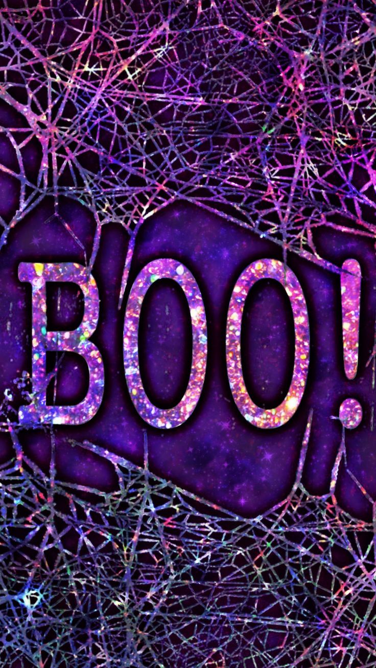 the word boo spelled out in front of purple and pink paint splattered branches