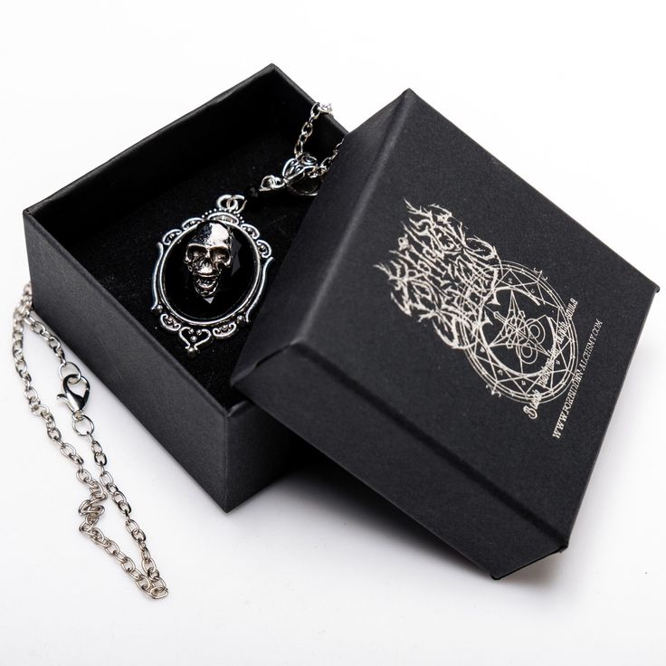 Crafted from stained alloy stainless steel, our Victorian skull necklace is a striking piece. Measuring 20 inches in length, it features a 1 by 1.5-inch skull pendant, perfect for adding a touch of gothic elegance to any Metal Skull Print Jewelry For Halloween, Gothic Metal Skull Necklace, Gothic Metal Necklace Engraved, Gothic Jewelry With Skull Print For Gift, Punk Style Metal Necklace With Skull Print, Punk Metal Necklace With Skull Print, Gothic Skull Print Necklace For Gifts, Gothic Skull Necklace In Stainless Steel, Gothic Engraved Stainless Steel Jewelry