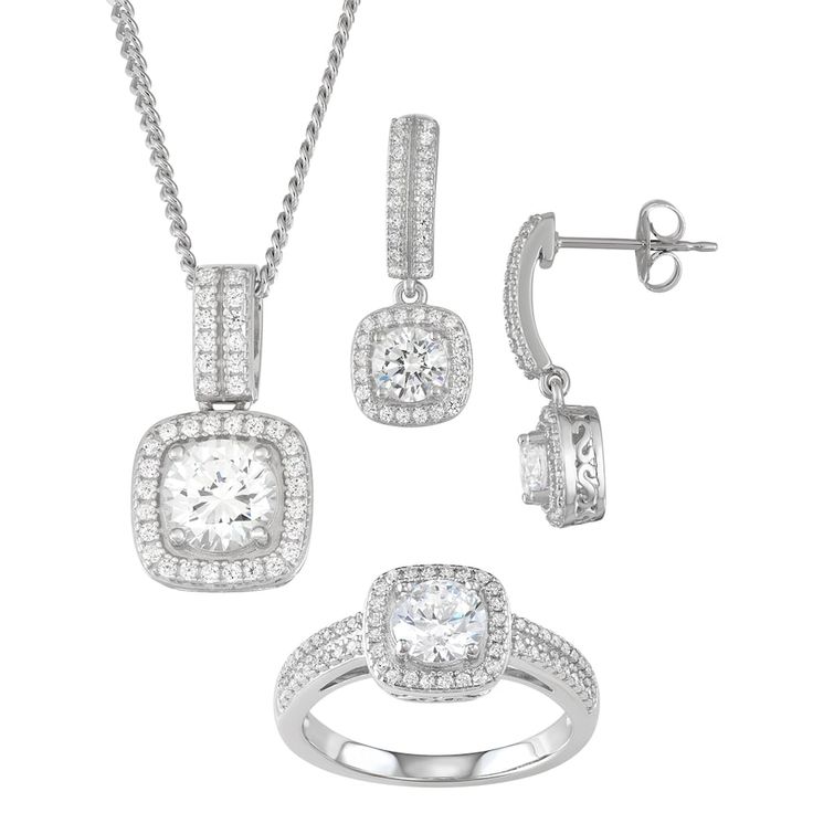 "Love your look with this 3-piece cubic zirconia jewelry set. 3-piece set includes: pendant necklace, ring, pair of earrings Base material: sterling silver Plating: rhodium Finish: polished Additional details: nickel free Packaging: boxed NECKLACE DETAILS Pendant size: 1.7"" x 0.37"" Length: 18 in. Drop length: 1.7 in. Chain type: curb Clasp: spring-ring RING DETAILS Size: 7 EARRING DETAILS Backings: post Length: 21.18 mm CUBIC ZIRCONIA DETAILS Total weight: 5 5/8 ct. Color: white Shape: round S Cubic Zirconia Jewelry Sets For Anniversary, Anniversary Jewelry Sets With Cubic Zirconia Round Cut, Fine Jewelry Set With Sparkling Stones For Anniversary, Silver Cubic Zirconia Jewelry Sets For Anniversary, Fine Jewelry Sets With Cubic Zirconia For Gifts, Fine Jewelry Sets Of Cubic Zirconia As Gift, Elegant Silver Jewelry Sets With Prong Setting, Dazzling White Gold Sterling Silver Jewelry Sets, Classic Silver Jewelry Sets For Anniversary