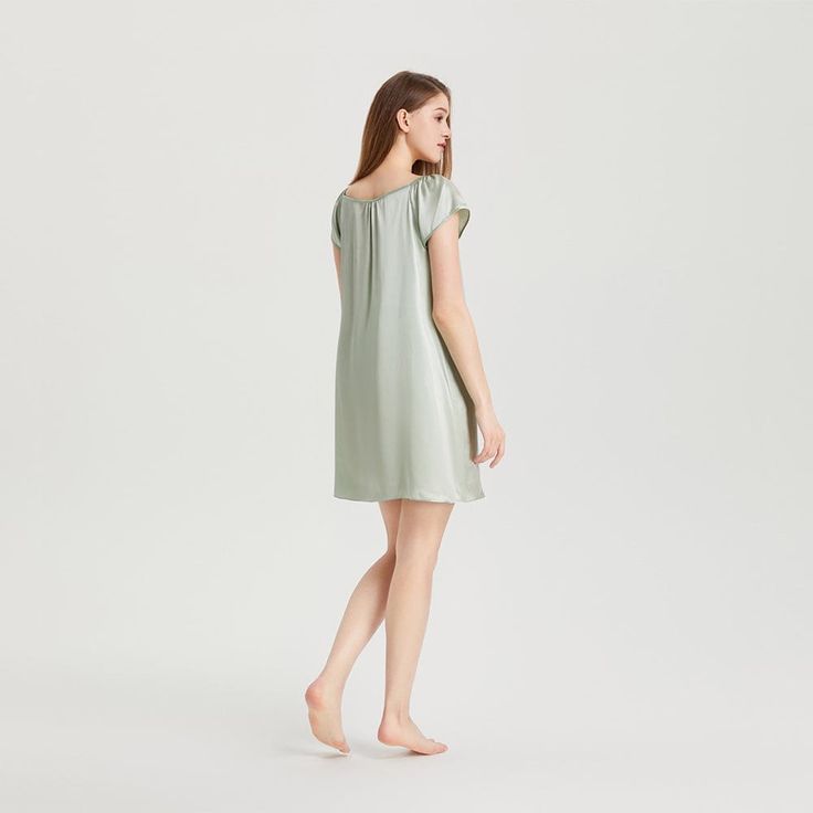 This 19 Momme Silk Short Sleeve Ruffle Nightgown is made of 100% Mulberry silk, which is lightweight, and naturally hypoallergenic. The simple yet modern design gives this chemise dress a perfect silhouette. It is a must-have for lounging at home. The silk slip straps are adjustable. It's sure to make you the star of the house, day or night! Sweet Ruffle Nightgown From now on, you no longer have to bear piercing fabrics and tight skirts that are too tight to breathe for the sake of sexiness. A s Silk V-neck Nightgown For Summer, Modal Satin Summer Sleepwear, Modal Satin Sleepwear For Summer, Feminine Silk Sleepwear For Summer, Casual Silk Sleepwear For Spring, Elegant Satin Sleepwear With Short Sleeves, Elegant Short Sleeve Satin Sleepwear, Silk Summer Nightgown For Sleep, Elegant Solid Color Summer Sleepwear