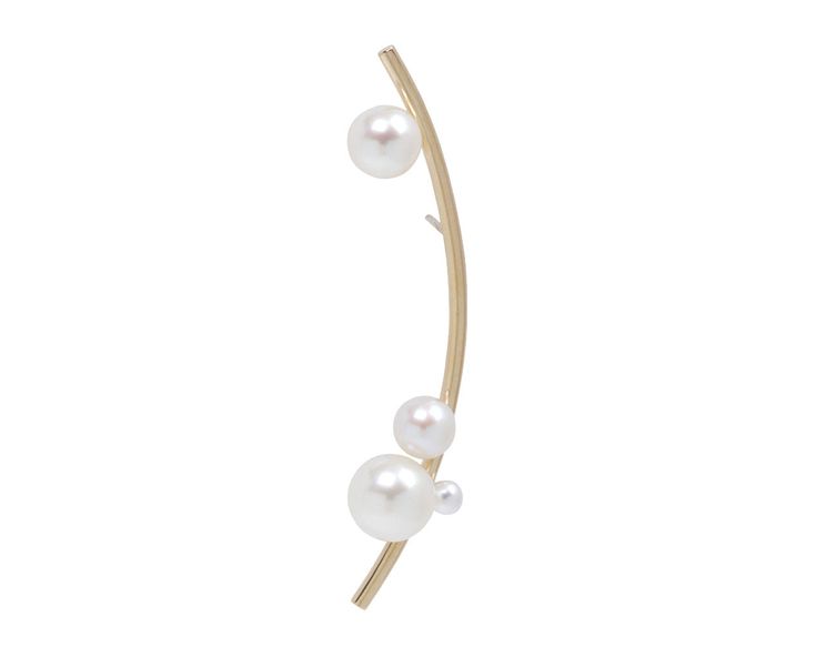 With a flourish of whimsical elegance and modern simplicity, this single Sophie Bille Brahe earring has a fluid, sculptural presence. Meant for the right lobe, the 14K yellow gold earring curves outward and is set with round, white freshwater pearls at its top and bottom. Statement-making no matter what earring you wear on the other side.14K yellow gold and pearl earring : 2 1/16" x 1/2"freshwater pearls : vary : 3mm diameter to 9mm diameter each14K yellow gold post backs*price is for SINGLE ear Modern White Single Pearl Earring, Modern Gold Ear Climbers For Formal Events, Elegant Gold Ear Climbers For Wedding, Elegant Pierced Ear Cuff For Evening, Elegant Gold Pierced Ear Climbers, Elegant Evening Pierced Ear Cuff, Elegant Single White Gold Ear Cuff, Elegant Evening Ear Cuff, Modern Single Ear Climber For Formal Occasions