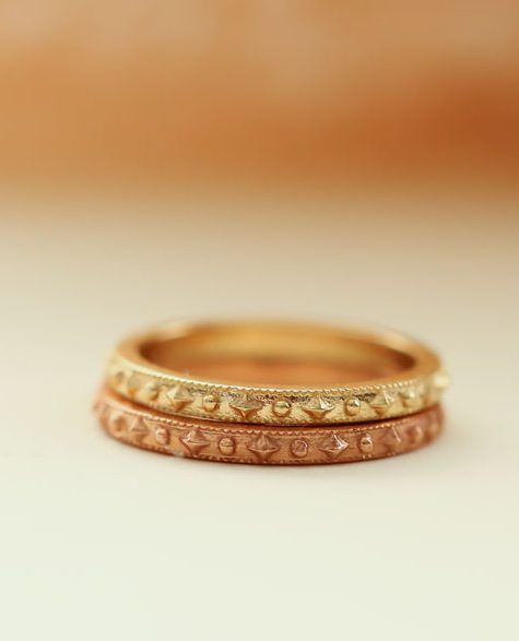 Cherished Gold Ring
With a delicate confetti beaded pattern surrounding the entire band, she's a reminder you're cherished. You cherish those you love most.  Beautiful crafted stacking ring perfectly pairs with other Erin Pelicano rings, or as a band worn in her own beauty. Stack one for each child, stack one for each of your favorite people, collect one for each milestone, or wear as your wedding band.

Designed and crafted in solid 14k gold, choose from white, yellow, or rose gold.

 	14k Handmade Rose Gold Stackable Rings For Wedding, Adjustable Stackable Rings With Diamond Cut, Promise Stackable Rings With Rose Cut Diamonds, Adjustable Halo Stackable Rings, Rose Gold Rings With Decorative Band, Heirloom Rings With Decorative Round Band, Rose Gold Decorative Band, Heirloom Stackable Open Band Jewelry, Heirloom Halo Stackable Rings For Promise