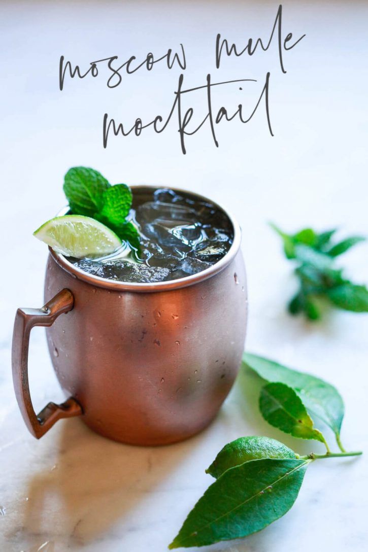 a copper cup with a lime and mint garnish