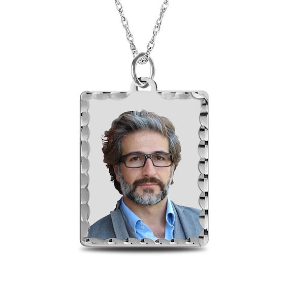 Turn one of your favorite memories into a treasured keepsake - this personalized and engravable rectangular photo pendant with diamond-cut edges. Crafted in sterling silver This rectangular pendant with a diamond-cut frame showcases your photo - expertly transferred using modern technology, and is scratch resistant, 100% waterproof and available in high resolution color or black and white. Further customize the look with up to three lines of sweet messages or meaningful phrases - each 20 charact Anniversary Diamond Cut Rectangular Pendant Necklace, Anniversary Rectangular Pendant Necklace With Diamond Cut, Sterling Silver Necklace With Rectangular Diamond Cut Pendant, Anniversary Jewelry With Rectangular Polished Pendant, Sterling Silver Rectangular Necklace For Personalized Gift, Rectangular Sterling Silver Necklace, Classic Engraved Rectangular Jewelry, Classic Rectangular Engraved Jewelry, Sterling Silver Rectangular Pendant For Anniversary