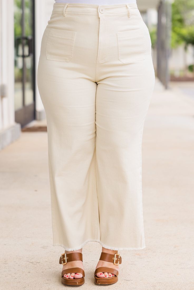 Get ready to tackle your day in style with our Girl On The Go Jeans in white! These jeans feature trendy front pockets and a frayed hemline, making them perfect for dressing up or down! Add a versatile and chic staple to your wardrobe with these must-have jeans! 97% Cotton, 3% Spandex Chic White Bottoms For Everyday, Chic Cream Pants For Everyday, Wide Leg Bottoms With Frayed Hem For Day Out, Mid-rise Cotton Pants For Day Out, Cream Pants For Everyday Spring Wear, White Jeans With Frayed Hem For Work, Chic White Pants With Frayed Hem, Everyday Cotton Bottoms With Frayed Hem, Cotton Bottoms With Frayed Hem For Everyday