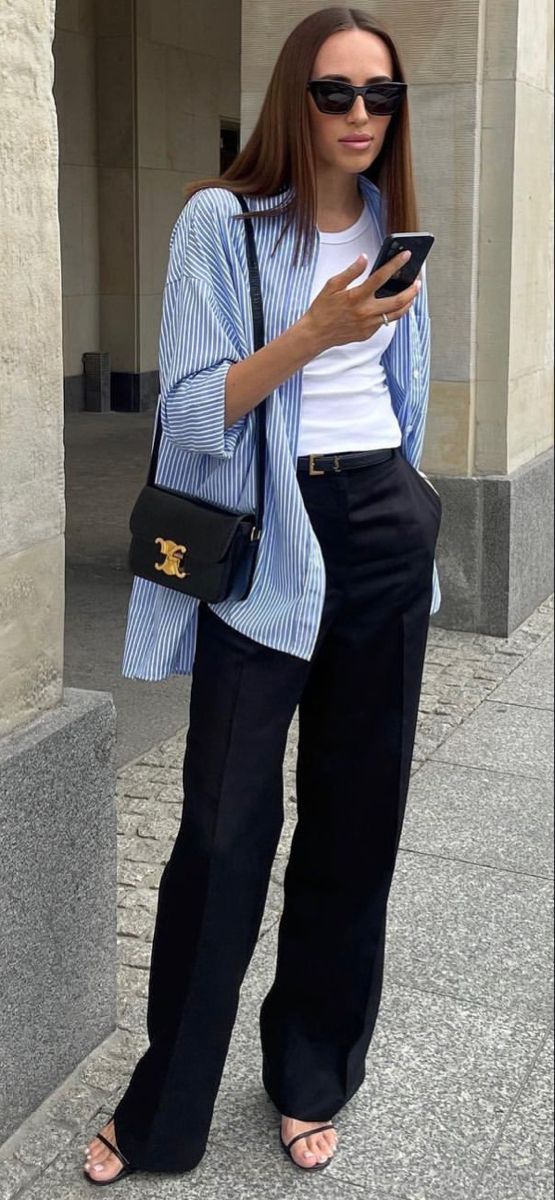 Blue Striped Shirt Street Style, Stripped Shirts For Women, Summer Job Outfits Casual, Blue White Stripes Shirt Outfit, Model Off Duty Style 2023, Stripped Shirt Outfit Woman, How To Style A Blue And White Striped Shirt, Blue Stripe Shirt Women Outfit, Blue And White Pinstripe Shirt Outfits