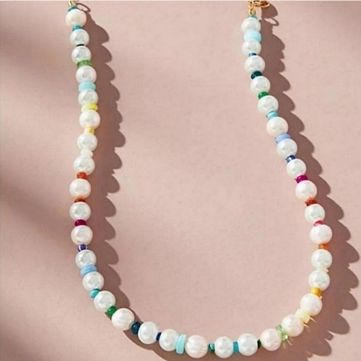 Offers Welcome This Anthropologie Beaded Rainbow Pearl Necklace Is Made Of White Glass Pearls With Different Color Rainbow Seed Beads In Between The Pearls. Necklace Closes With A Gold Lobster Clasp Closure. Necklace Length Is 16" With Extender So You Can Make It Longer Or Shorter. Pearl Size Approximately 6mm. Neckmess Ideas, Beaded Rainbow, Blue Turquoise Necklace, Bead Creations, Rainbow Pearl, Stone Choker, Daisy Necklace, Rainbow Jewelry, Fun Jewelry