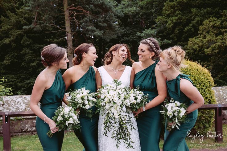 a group of women standing next to each other