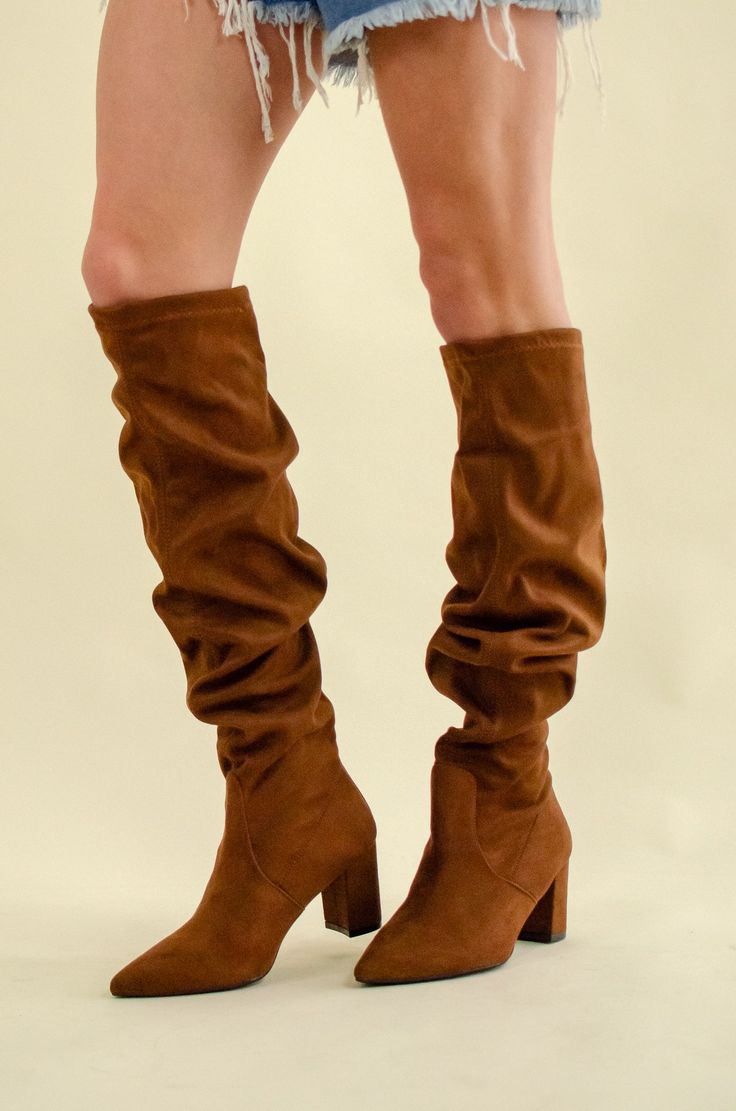 Our Katie Boot is the PERFECT fit for our athletic and curvy built gals! Features a back zipper for easy pull-on and high stretch faux suede with a wide fit calf. We love the above-the-knee fit and versatile color! Calf measures 17 inches on a size 8 and varies between sizes. Model is wearing a size 7.5 and has 13in circumference calves with plenty of space in the legs. Wide Calf Boots, Wide Calf, Boots Brown, Calf Boots, Brown Boots, Above The Knee, Knee High Boots, Faux Suede, Knee High