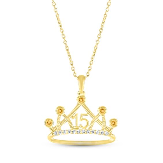 In your eyes, she's a princess. Show her how special she is on her Quinceañera with this gorgeous crown necklace emblazoned with the number 15. Sunny citrines – the birthstone of November – gleam in bezel settings on the points of the regal 10K yellow gold crown. White lab-created sapphire accents add eye-catching sparkle. The pendant sways from an 18-inch cable chain that secures with a spring ring clasp. Gold Birthday Jewelry With Crown Design, Gold Jewelry With Crown Design For Birthday, Princess Style Jewelry With Tall Crown Design, Princess Crown Jewelry For Anniversary, Number 15, Crown Necklace, White Lab, Gold Crown, Accessories Jewelry Necklace