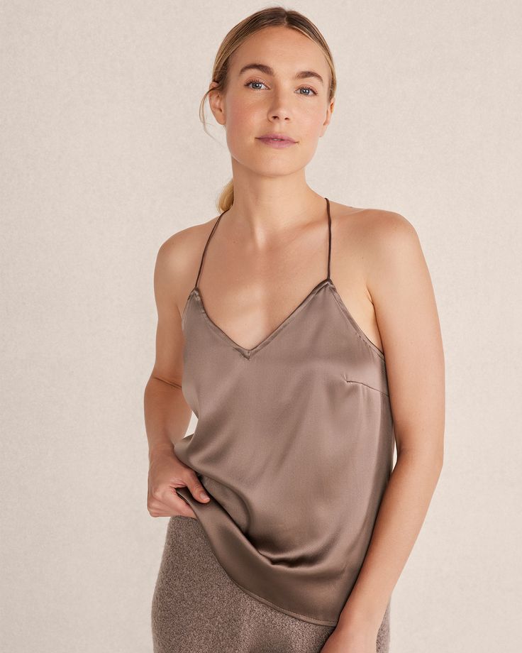 The luxury of silk—but make it washable. Our unique camisole features spaghetti straps with a delicate criss-cross back. Expect sweet dreams. Details + Design: Sleeveless. Spaghetti straps. Hits below hip. 20” length. Material: 92% Silk, 8% SpandexCare: Machine Wash; Line DryImported | Washable Silk Camisole Haven Well Within Silk V-neck Tank Top With Adjustable Straps, Feminine Silk Camisole With Built-in Bra, Silk Cami Tank Top With Built-in Bra, Silk Camisole With Built-in Bra, Silk Camisole With Built-in Bra And Spaghetti Straps, Spaghetti Strap Camisole With Built-in Bra For Night Out, Silk V-neck Tops With Adjustable Straps, Satin Camisole With Built-in Bra For Loungewear, Chic Seamless Tank Camisole