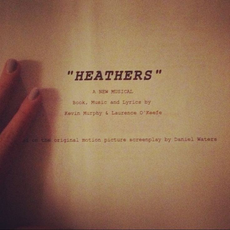 someone is writing on a piece of paper with the words heathers written below it