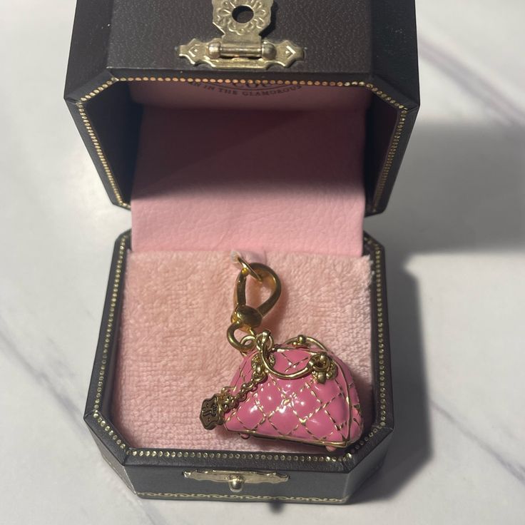 Authentic Juicy Couture Charm In Original Box Never Used Elegant Pink Bag For Gift, Elegant Pink Bags For Valentine's Day, Chic Rose Gold Bag For Gift, Chic Rose Gold Bag As Gift, Small Pink Elegant Bag, Small Elegant Pink Bag, Luxury Pink Bag For Valentine's Day, Luxury Pink Bags For Gifts, Designer Pink Bags As Gift