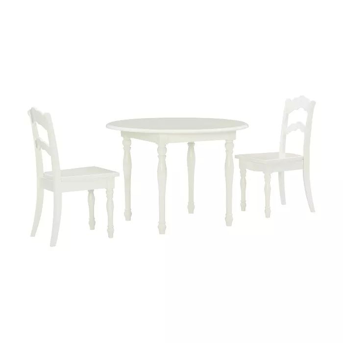 a white table and two chairs sitting next to each other