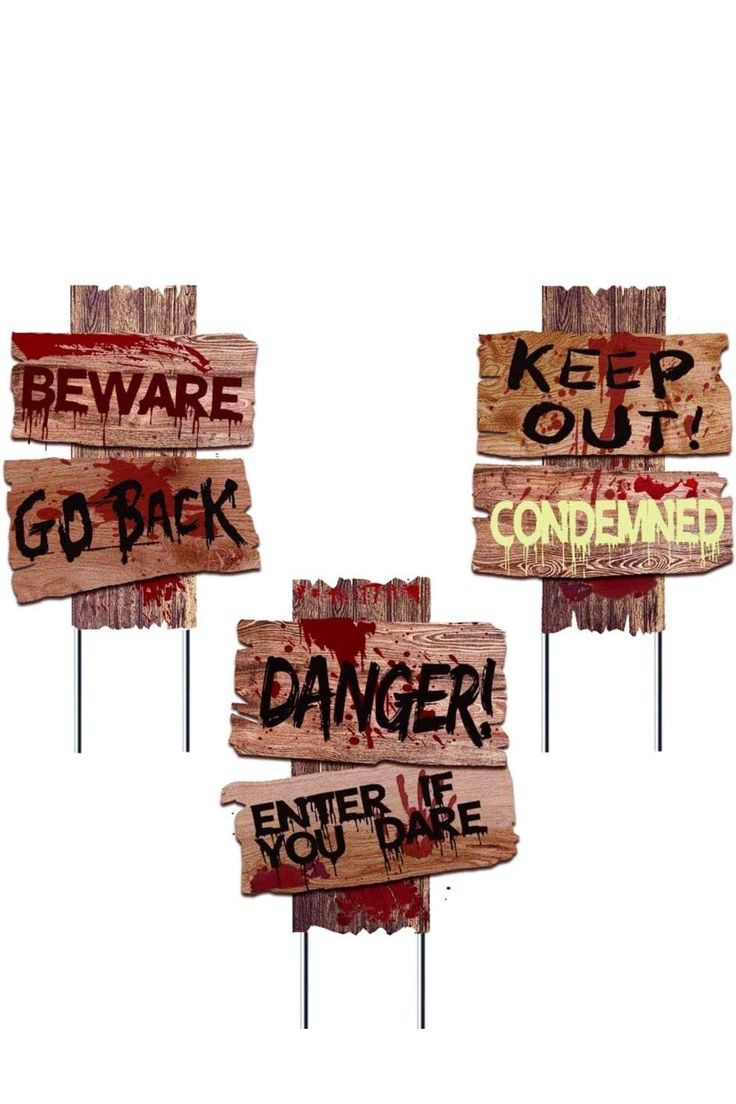 four wooden signs that say beware go back, danger, and enter you die