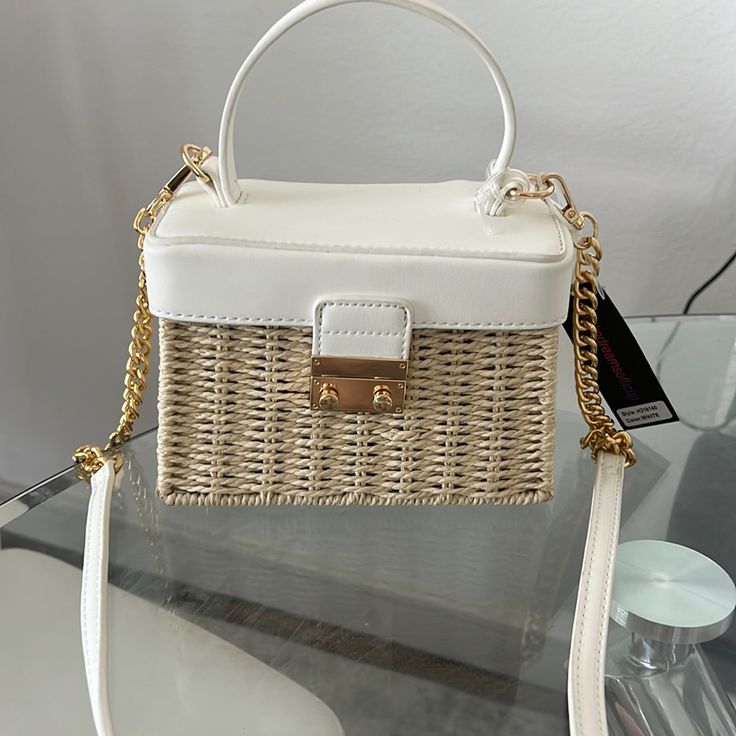 Brand New, Never Worn. Like Dreams Brand Bought From Macy’s Wicker And So Cute For Vacation Or Summer :) [Dimensions] 7.25"W 5"H 3.5"D, Top Handle 3.5", 23" Detachable Strap, 1 Push Lock Closure, 1 Inner Wall. On Amazon This Bag Is $53 Right Now! Great Deal Trendy White Box Bag For Daily Use, Chic White Box Bag With Large Capacity, Trendy White Large Capacity Box Bag, Chic White Large Capacity Box Bag, White Large Capacity Satchel Box Bag, Large Capacity White Shoulder Box Bag, Casual White Crossbody Box Bag, Large Capacity White Box Shoulder Bag, Elegant White Top Handle Straw Bag