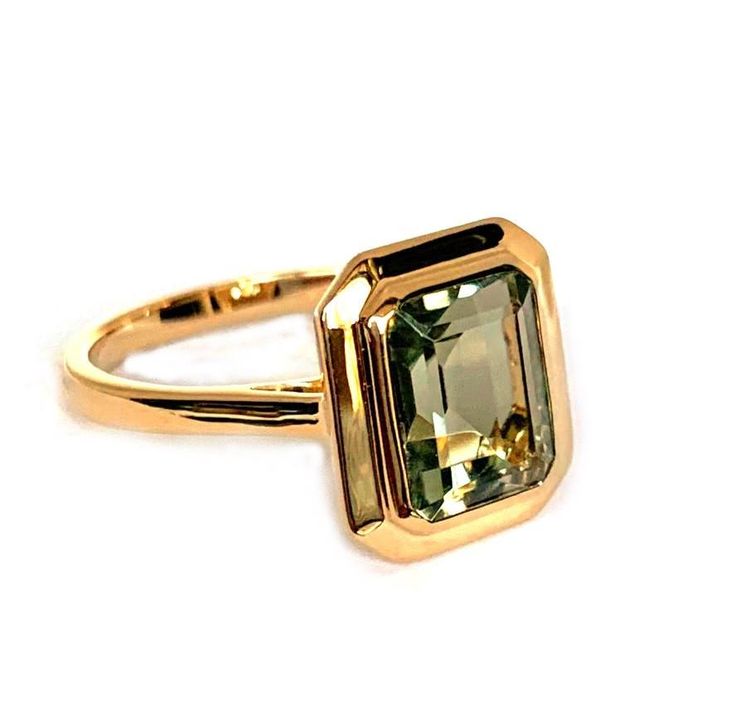 emerald cut green amethyst set in 14k gold bezel set f matching earrings ME2496GAM and pendant MP3478GAM available m Please Inquire For Other Color Stone Centers m Stone Information: 1 11 x 9 mm emerald cut green amethyst 4.57 cts Gold: white, yellow and rose gold In Stock: 1 available in 14K yellow gold Luxury Green Jewelry With Bezel Setting, Modern Green Emerald-cut Jewelry, Modern Octagon Jewelry With Bezel Setting, Classic Jewelry With Emerald Cut Bezel Setting, Classic Emerald Cut Jewelry With Bezel Setting, Classic Emerald Cut Bezel Set Jewelry, Timeless Yellow Gold Jewelry With Rectangular Stone, Modern Green Jewelry With Prong Setting, 14k Gold Jewelry With Baguette Cut Bezel Setting