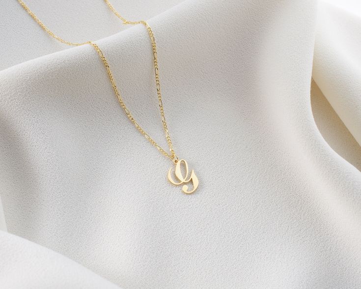 "* Cursive Initial Charm Letter Necklace *  Wear the initials of someone close to you and feel their presence always. Our dainty letter necklace in gold is a great option to subtly keep your loved ones close and works perfectly as a romantic gift for a birthday, anniversary or Christmas. Custom Script Letter Charm Necklace is perfect for layering for a personalized, elevated look. We offer 4 finish colors which are Silver, Gold, Rose and Black Can be used as a perfect gift for both women/girls, Gold Initial Necklace With Adjustable Chain For Mother's Day, Gold Initial Necklace With Clavicle Chain For Mother's Day, Gold Charm Necklace With Adjustable Chain For Bridesmaid Gift, Elegant Gold Initial Necklace For Wedding, Dainty Gold Name Necklace For Wedding, Elegant Gold Initial Necklace For Bridesmaids, Elegant Gold Name Necklace For Bridesmaid, Gold Necklaces For Bridesmaid Gift On Mother's Day, Gold Initial Necklace For Anniversary