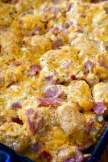 a casserole dish with ham and cheese on it