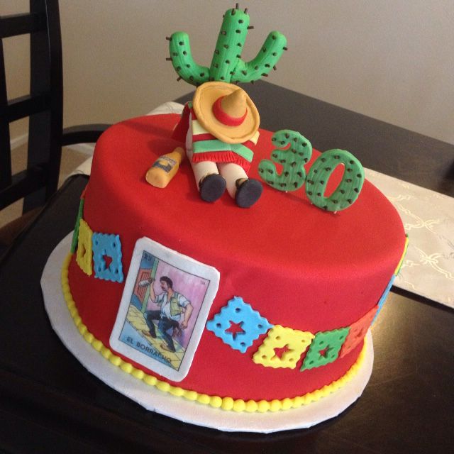 a birthday cake with an image of a man sitting on top of it and the number 50