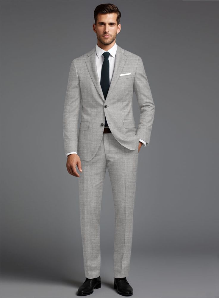 Build your elegant custom wardrobe with our Stretch Light Gray Wool Suit. Crafted from a wool blend, the suit has a smooth finish and is versatile enough to provide you a modern look and confident demeanor, also an ideal pick for any important occasion.  
 
 Look Includes  Stretch Light Gray Wool Fabric  Two Button Jacket Style  Notch Lapel  Horn Royal Black Buttons  Single Vent  Three Cuff Buttons  Two Welted Back Pockets on Trousers   You can change the look during customization if required. Custom Wardrobe, Grey Tweed Suit, Herringbone Tweed Jacket, White Linen Suit, Green Velvet Jacket, Peaky Blinders Suit, Grey Wool Suit, Royal Blue Suit, Blue Chinos