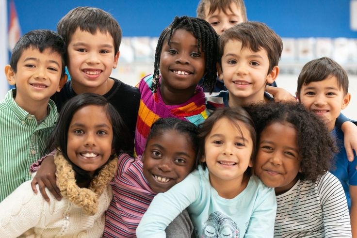 a group of young children posing for a photo together stock photo and royalty - all images are