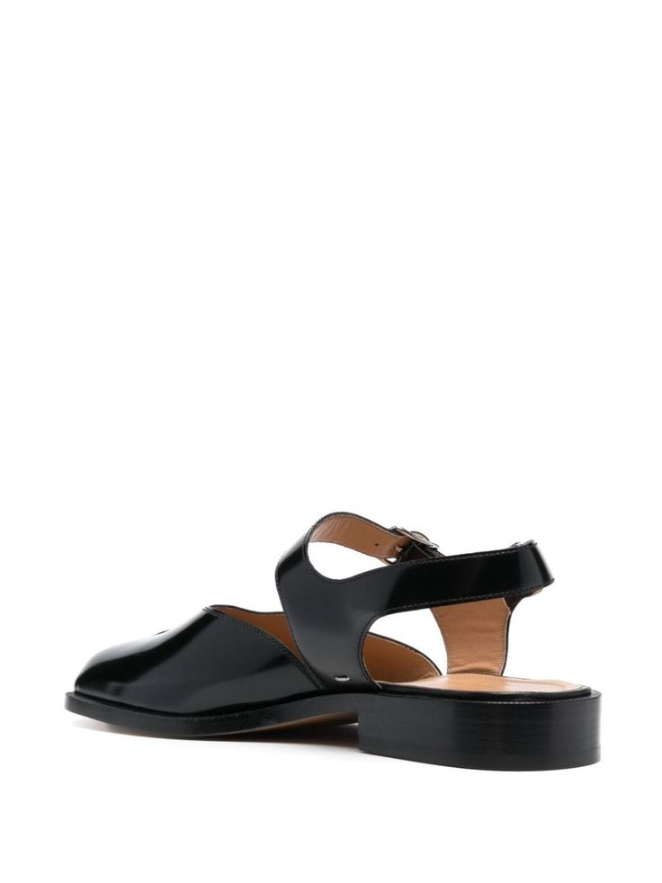 Maison Margiela Tabi ankle-strap Leather Sandals - Farfetch Chic Calf Leather Sandals With Tang Buckle, Low Heel Calf Leather Sandals, Formal Open Toe Flats With Buckle Closure, Chic Ankle Strap Flats In Calf Leather, Designer Calf Leather Sandals With Low Heel, Designer Calf Leather Low Heel Sandals, Classic Calf Leather Flat Sandals, Ankle Strap Sandals With Leather Sole, Classic Slingback Sandals With Calf Leather Sole